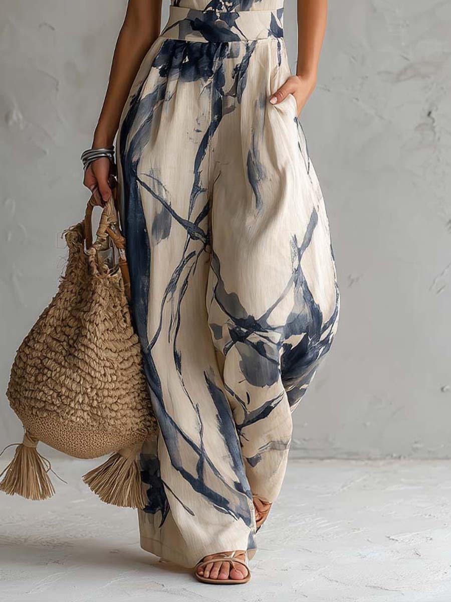Riley | Halter Neck Ink Wash Print Wide Leg Jumpsuit With Pockets